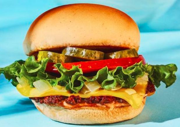 Veg-e-licious Burger (Vegetarian) · Veggie lovers favorite, veggie patty, house sauce, leaf lettuce, Roma tomato, pickles, shaved onions, and American cheese.