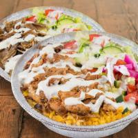 Lamb Gyro over Rice · Chunks of Lamb on Rice with Lettuce, Tomato, Onion, Green peppers & Gyro sauce