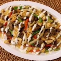 Mix Chicken and Lamb Gyro over Rice · Chunks of Chicken & Lamb on Rice with Lettuce, Tomato, Onion, Green peppers & Gyro sauce