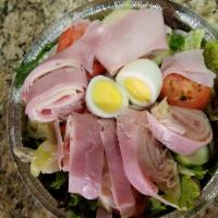 Chef Salad · Garden salad topped with mixed cold cuts ham, turkey and provolone and hard-boiled egg.