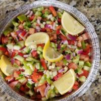 Our Special Place Salad · Diced tomatoes, diced cucumbers, peppers, onion, fresh parsley, olive oil, and lemon dressin...