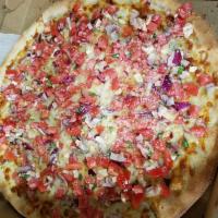Bruschetta Pizza · Diced tomatoes, red onions, garlic, olive oil, fresh basil, and fresh mozzarella cheese.