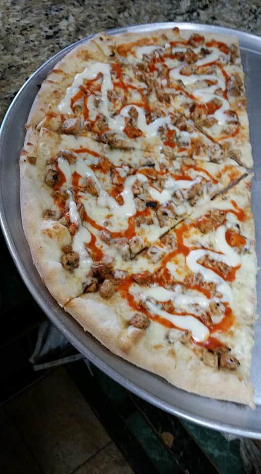 Buffalo Chicken Pizza · Grilled chicken, Buffalo sauce and choice of ranch or blue cheese dressing.