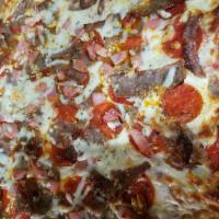 Chicago Style Deep Dish Pizza · Pepperoni, ham, sausage and fresh garlic.