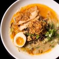 Kai's White Ramen · Most popular pork soup, salt base, thin noodle, garlic butter, pork belly flavored egg, scal...