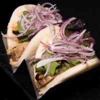 Pork Chashu Bun  · Flavored Pork Belly Served with steamed bun, spring mixed and mayo sauce 