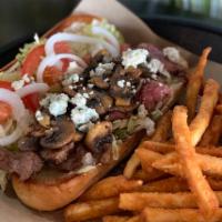 Black/Bleu Steak Sandwich · Grilled steak topped with Bleu cheese, mushrooms, tomato lettuce, onion, and mayo served on ...