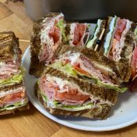 Club House · Turkey, ham, and bacon triple-decker sandwich with fresh lettuce, tomato, and mayo on your c...