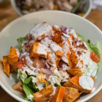 Buffalo Chicken Ranch Wedge · Iceberg Wedge, grilled or crispy chicken tossed in buffalo sauce, red onion, tomato, bacon, ...