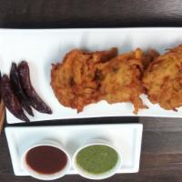 Onion Bhaji · Diced onion and potatoes in fried chickpea batter.