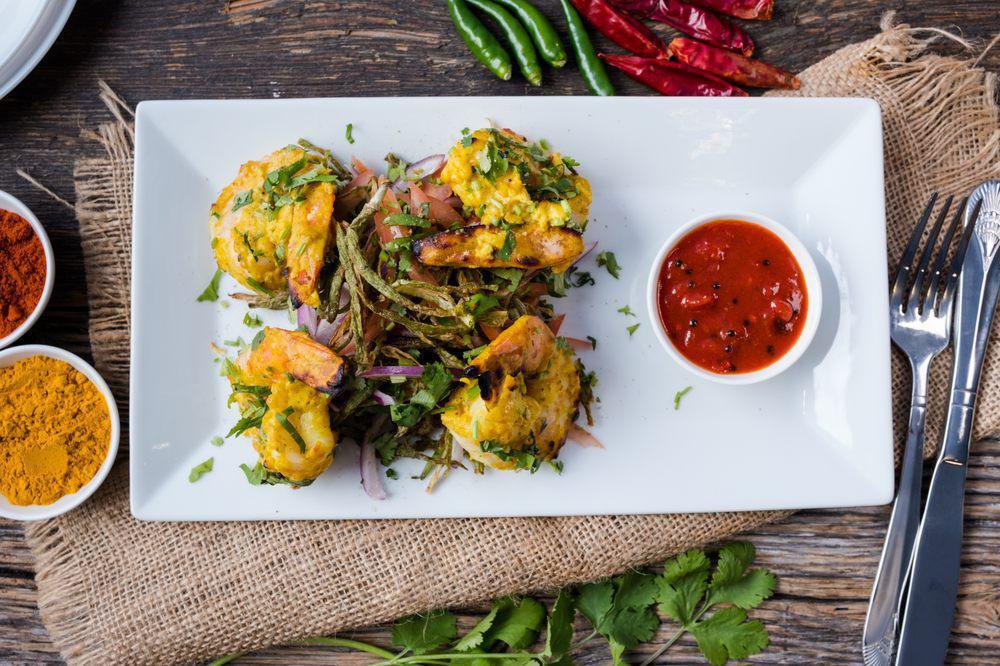 Grilled Shrimp  · Jumbo shrimp marinated in fresh herbs and spices.