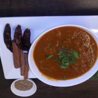 Lamb Curry · Slow-cooked, boneless tender lamb cooked in a special gravy and exotic spices.