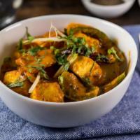 Kadai Paneer · Paneer cooked with tomatoes, onions, bell peppers and a blend of Indian spices.