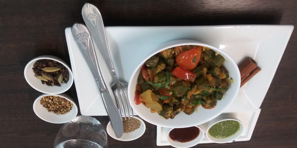 Bhindi Masala · Fresh okra with spices.