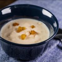 Rice Pudding · Candied almonds, cinnamon and golden raisins.