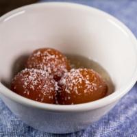 Gulab Jaamun · Sweet, deep-fried cheese ball in honey syrup.