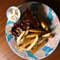 BBQ Baby Back Ribs  · A half rack of slow cooked , fall off the bone pork ribs basted in a mesquite BBQ sauce ... ...