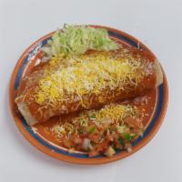 Wet Chile Relleno · The specialty of the house. Rice and beans.
