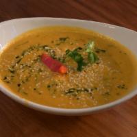 Chicken Dhaniya-D · Chicken morsels prepared with cilantro and nuts-based sauce. Sauce is also available with ve...