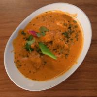 Chicken Kozhambu-D · Medium spicy chicken entree with fresh coconut, southern-Indian-style. Dairy free. Sauce is ...