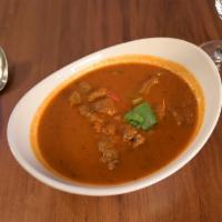 Lamb Rogan Josh-D · Lamb morsels cooked in a yogurt, tomato, and onion-based sauce. Sauce is also available with...