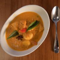 Seafood Kerala Curry-D · Shrimp, scallops, and fish(salmon) cooked in a coconut-flavored Kerala-style sauce. Sauce is...