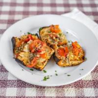Bruschette · Warm Italian bread with chopped tomato, basil garlic, onion and olive oil.