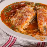 Meat Lasagna · Our famous lasagna, layered with seasoned beef, topped with mozzarella and baked to perfecti...