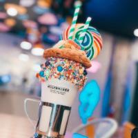 Cool Shake · Colorfull rim vanilla shake topped with chocolate chip cookie, hard candy lollipop and sour ...