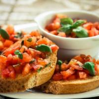 Bruschetta Pomodori · Crusty bread, tomato relish, and fresh mozzarella.
