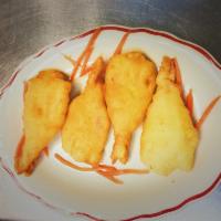 7. Fried Shrimp · 4 pieces. Shrimp cooked in oil.