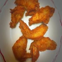 13. Fried Chicken Wings · 6 pieces. Cooked wings of a chicken coated in sauce or seasoning. 