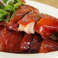 57. Roast Duck · Roasted and served with Chinese pancakes and hoisin sauce.
