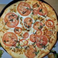 Napoli Gluten Free Crust Pizza · Housemade roasted garlic sauce, mozzarella, Roma tomatoes, Parmesan and fresh basil.
