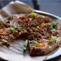 Berkeley Vegan Pizza · Housemade marinara sauce, vegan cheese, vegan sausage, roasted zucchini, baby heirloom tomat...