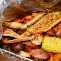 1 lb. Boiled Seafood  · Each pound served with one corn and one potato.