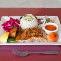 Grilled Salmon  · Marinated and chargrilled salmon served with rice. 