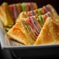 CLUB · Triple decker of roasted turkey, beef, ham, American cheese, bacon, tomatoes, lettuce and ma...