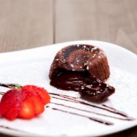 Chocolate Souffle · Moist chocolate cake with heart of creamy rich chocolate ice cream is served optional. Add i...