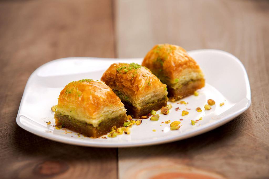 Baklava Portion · Sweet pastry made of layers of filo pastry filled with chopped nuts and sweetened with syrup.