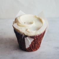 Red Velvet Cupcake · A little chocolate, a little vanilla, and lots of deep red color, topped with a heap of crea...