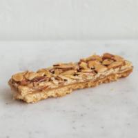 Bee Sting · Shortbread crust with a sliced almond/honey topping.