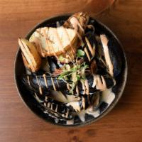Mussels · white wine, garlic, tomato, basil, crostini