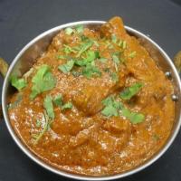 Lamb Kadai · Lamb cooked with sauteed onion, tomatoes, bell pepper, herbs and spices. Served with rice.