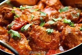 Kadai Chicken · Delicious boneless chicken cooked with sauteed onions, tomatoes, bell peppers, herbs and spices served in a fancy imported dish. Served with rice.