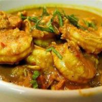 Goan Shrimp Curry · A traditional Goan shrimp curry cooked to perfection with a taste of coconut milk. Served wi...