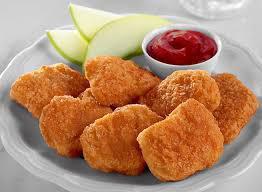 Kids Chicken Nuggets · Served with fries.