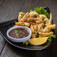 Soft Shell Crab · 2 pieces lightly deep-fried soft shell crab with ponzu sauce.