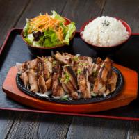 Chicken Teriyaki · Grilled chicken with house-made teriyaki sauce. Served with rice, and salad.