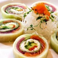 Protein Roll · Top: cucumber wrap and chef special sauce. In: salmon, tuna, albacore, crab mix, avocado, an...